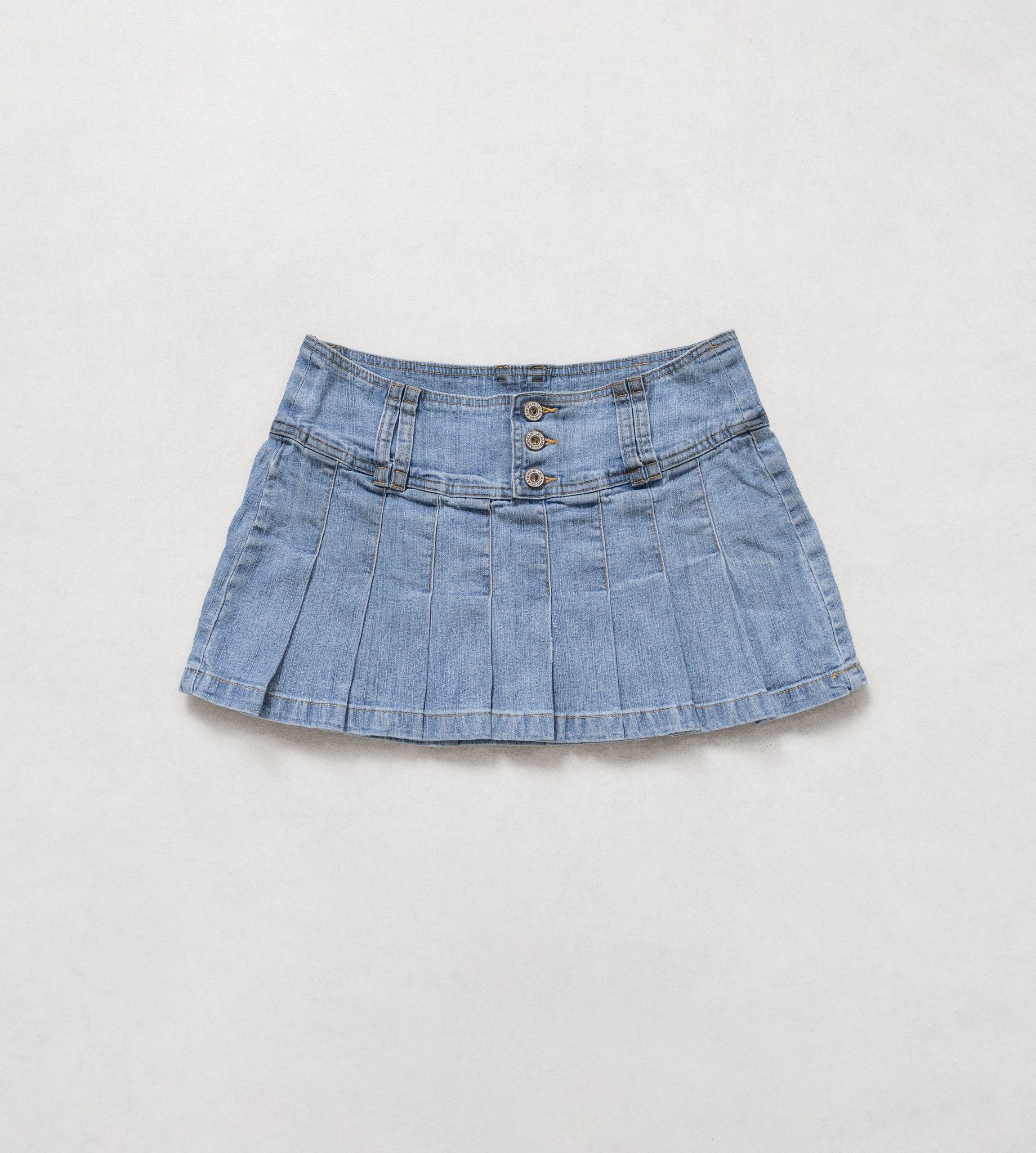 Denim skirt on a light gray background