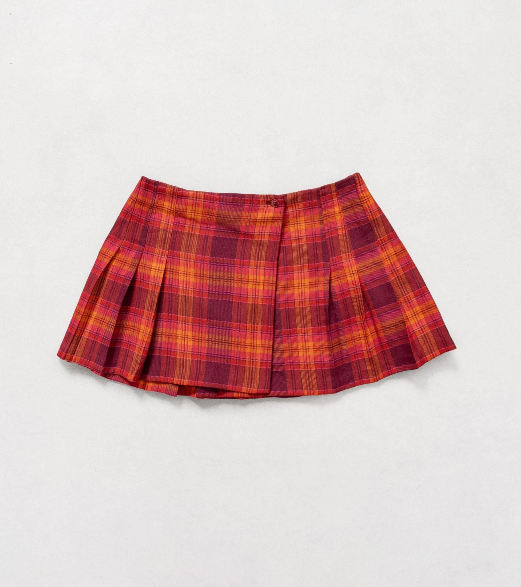 Red plaid skirt on a light gray background