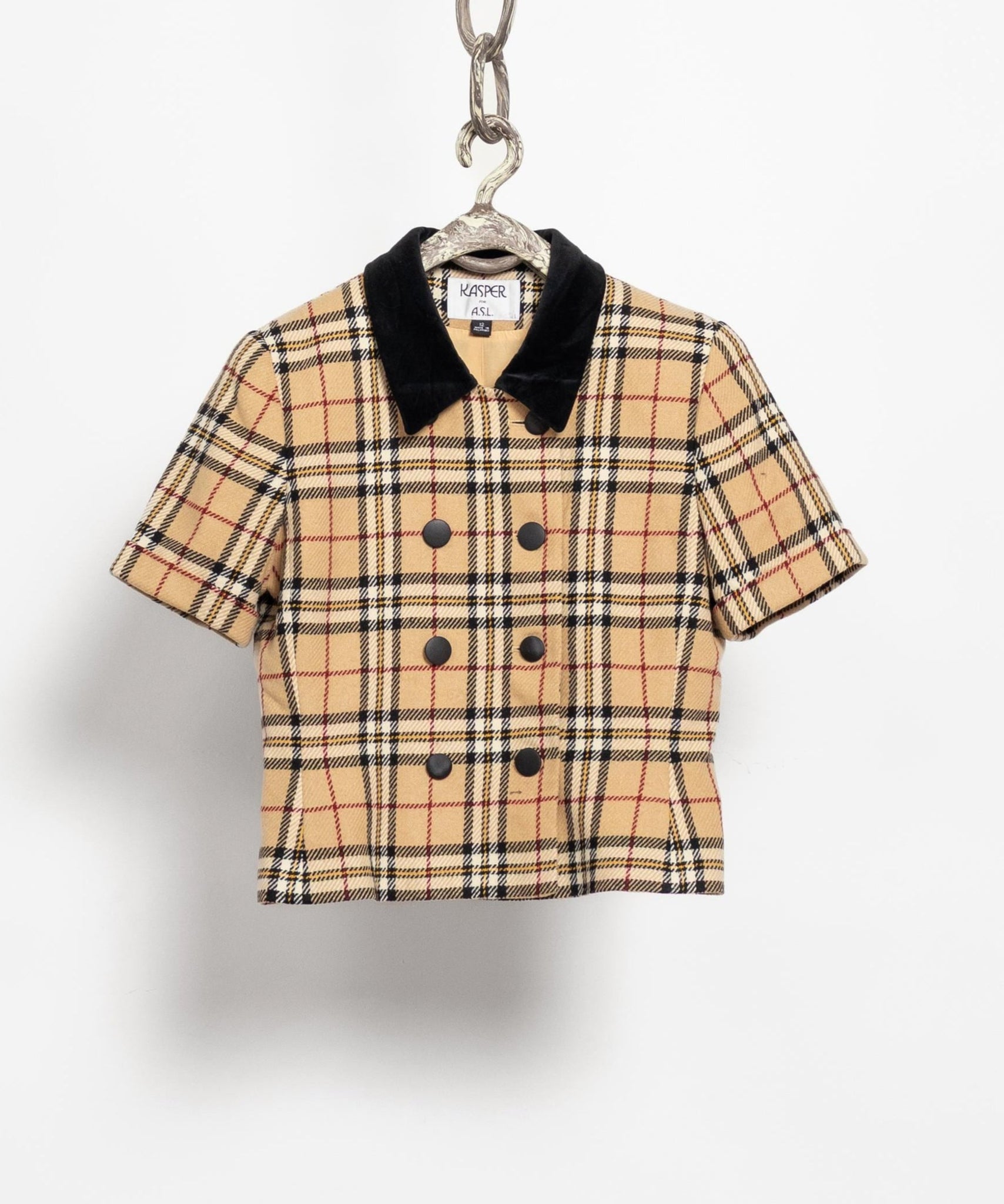Plaid shirt keychain on a hanger against a white background