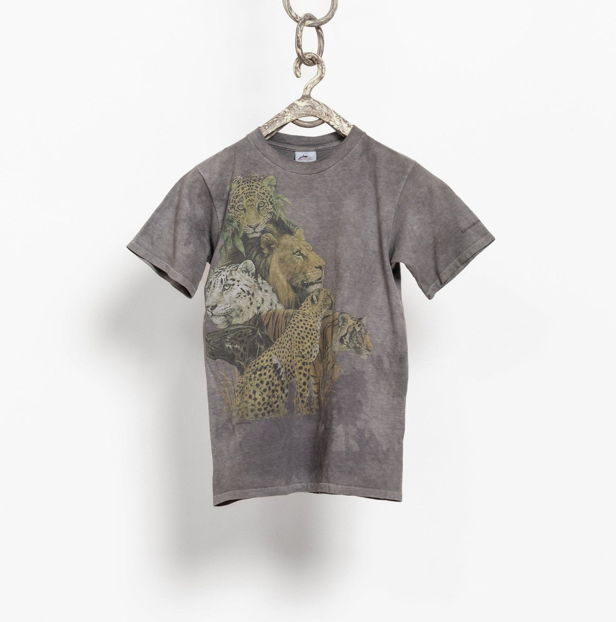 Gray t-shirt with a leopard print design hanging on a white background