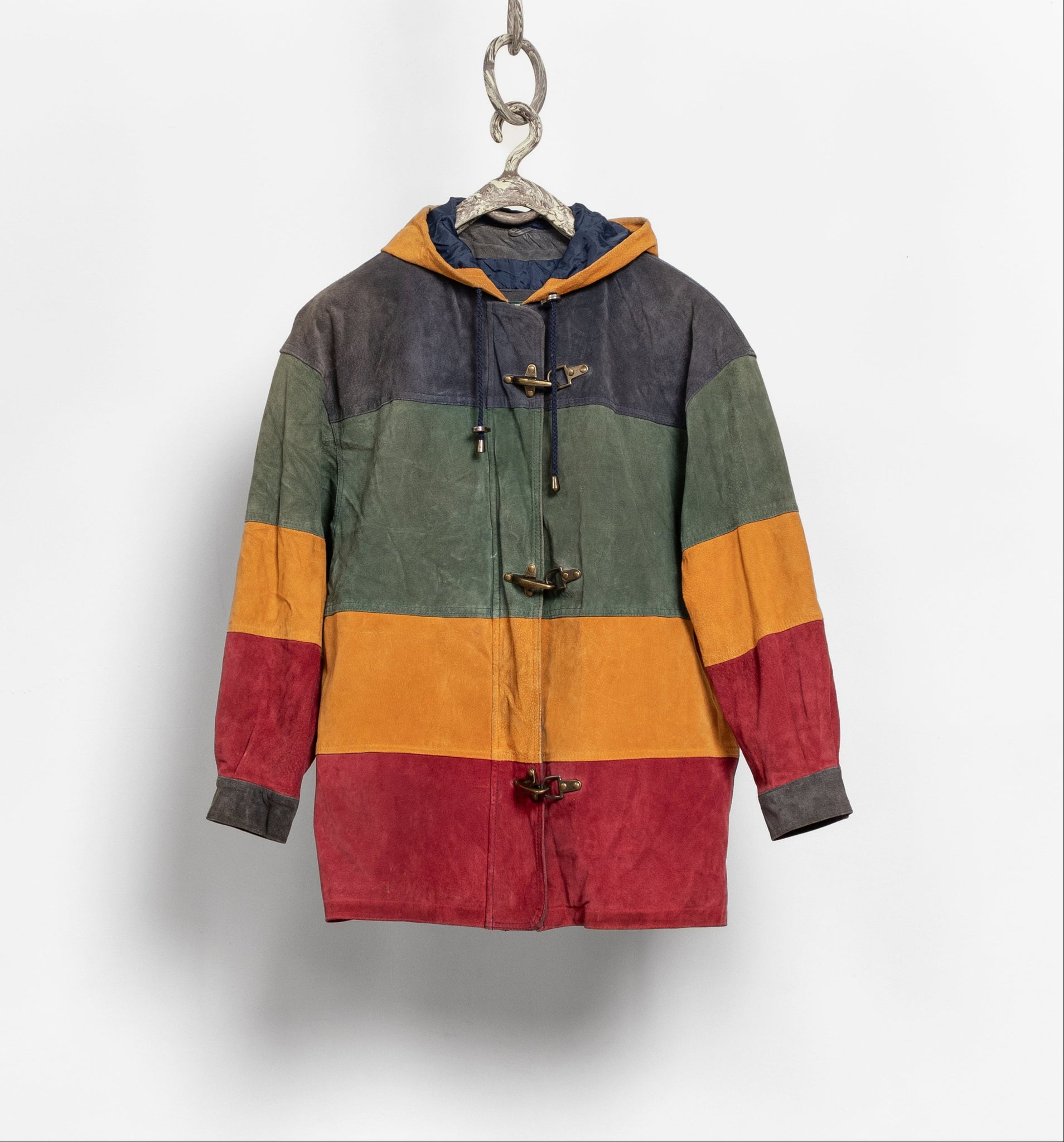 Colorful jacket with a hood hanging on a white background