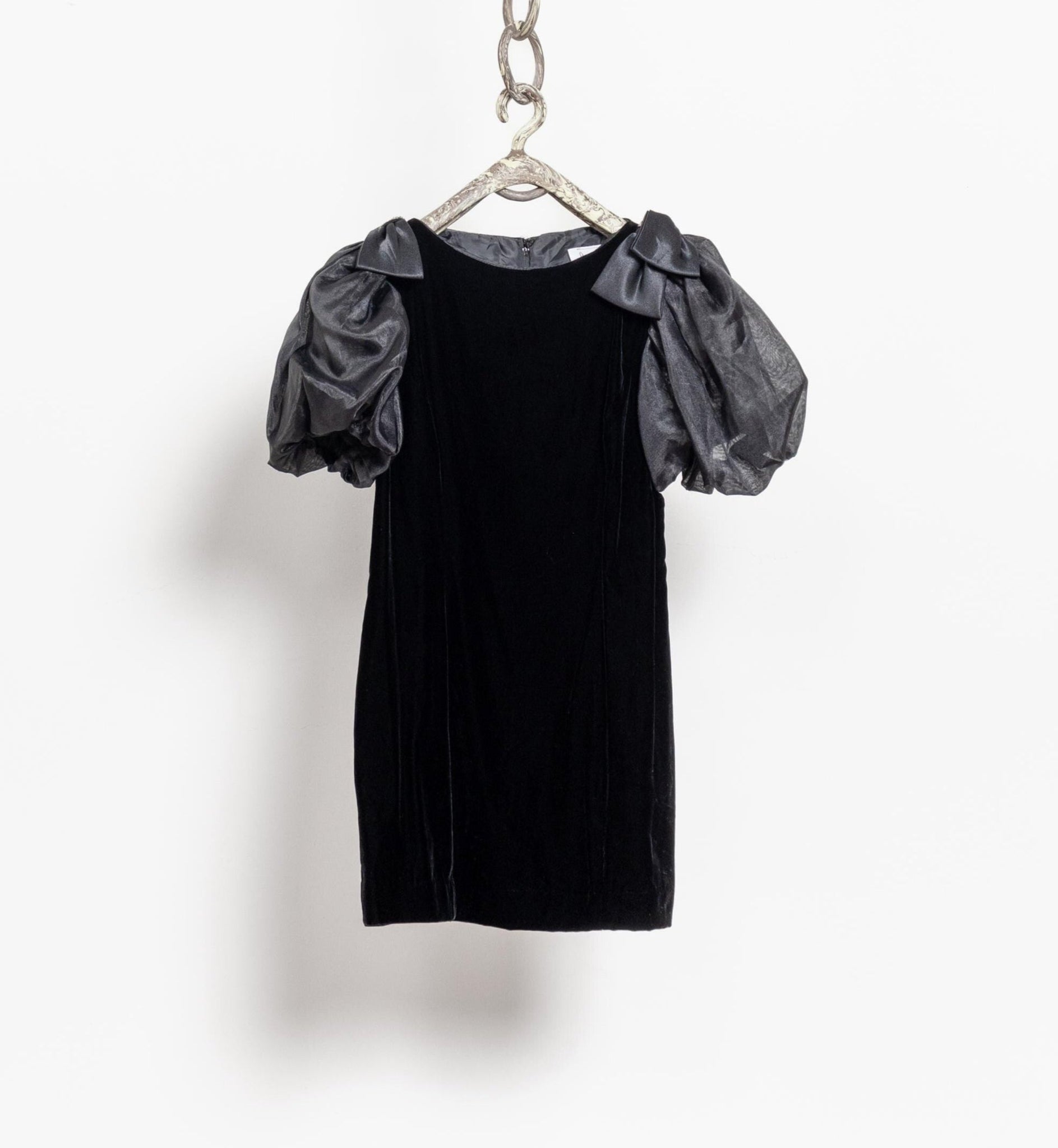 Black dress with gray puff sleeves on a white background