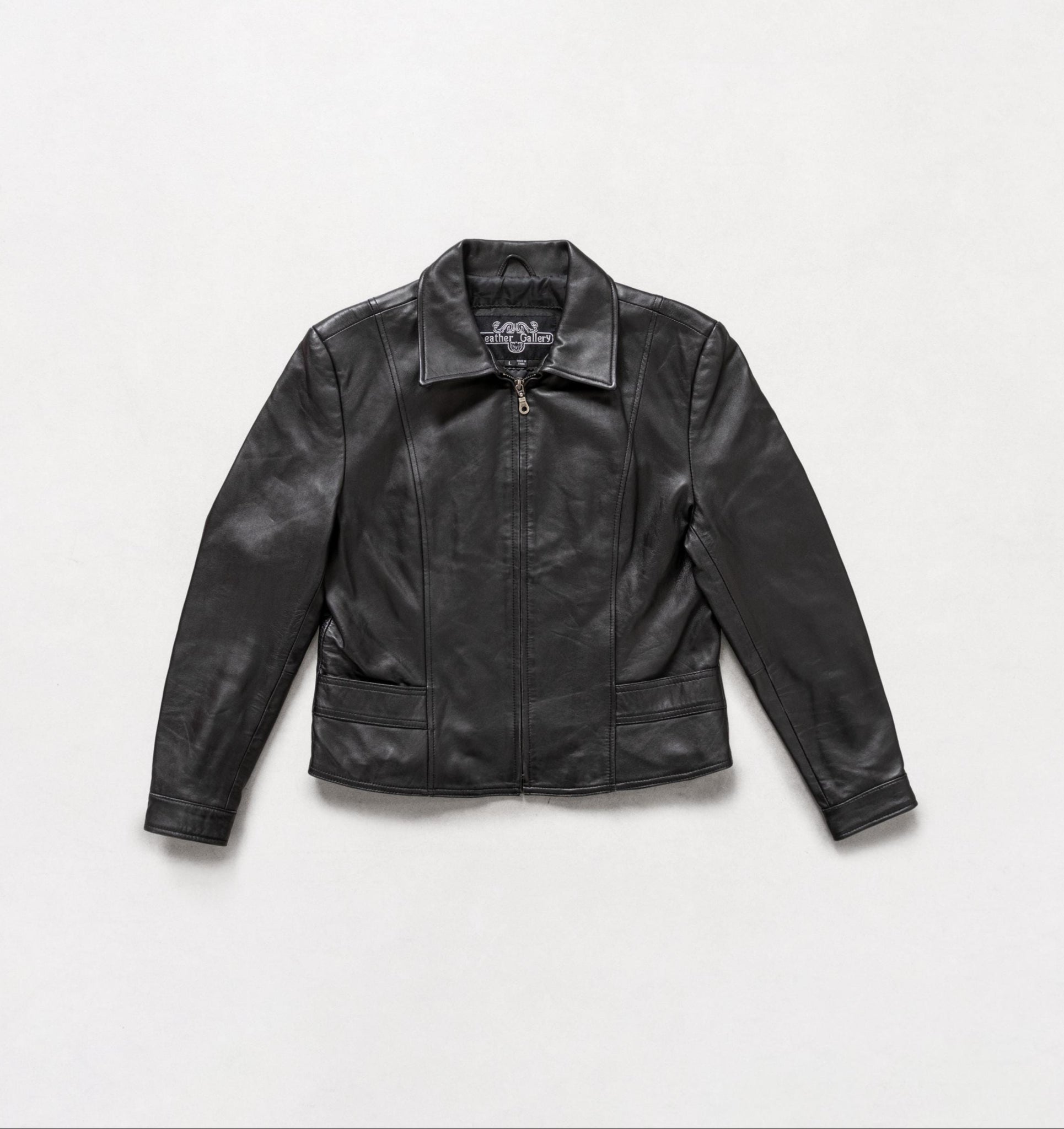 Black leather jacket on a white background