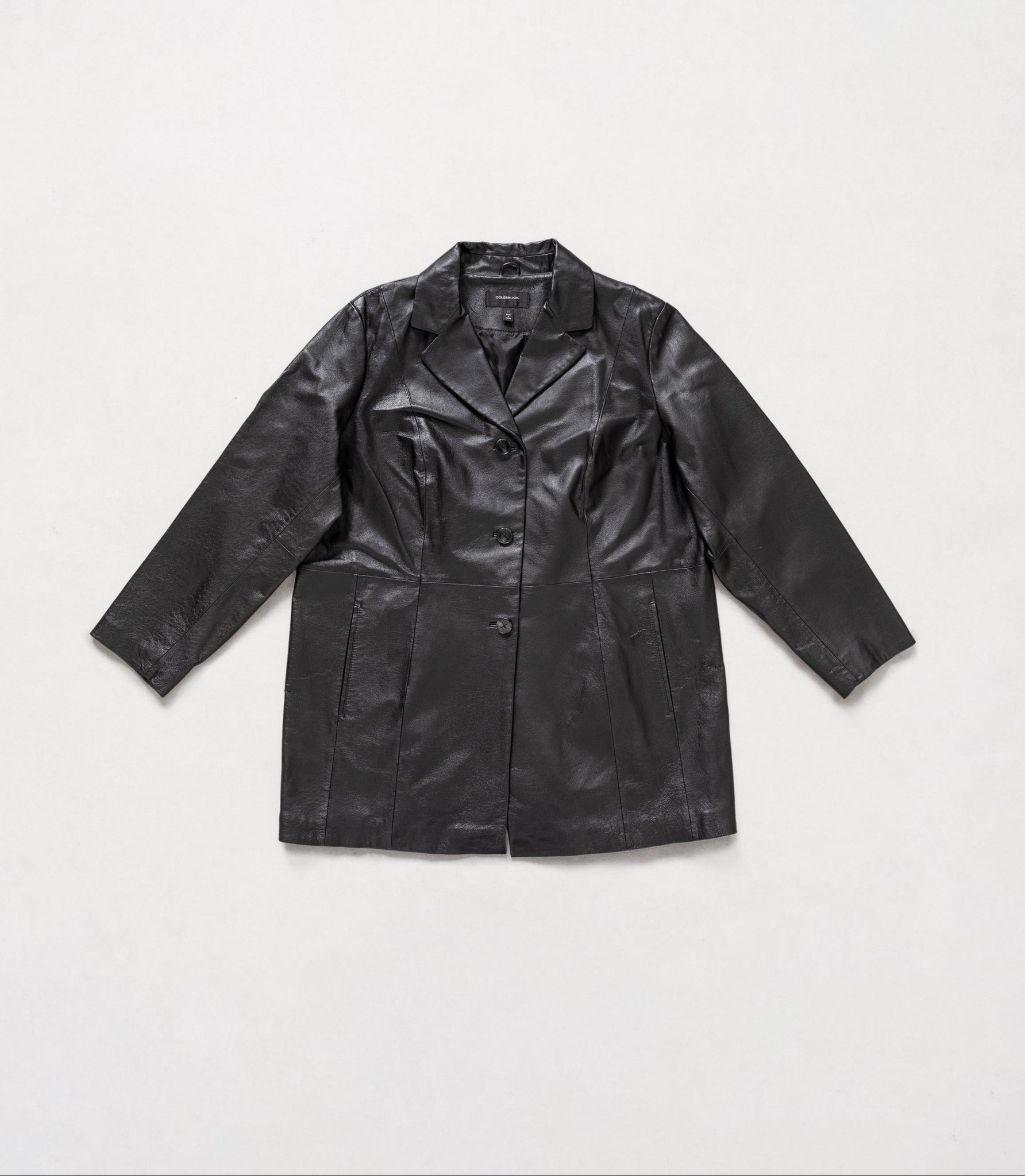 Black leather coat on a light gray background