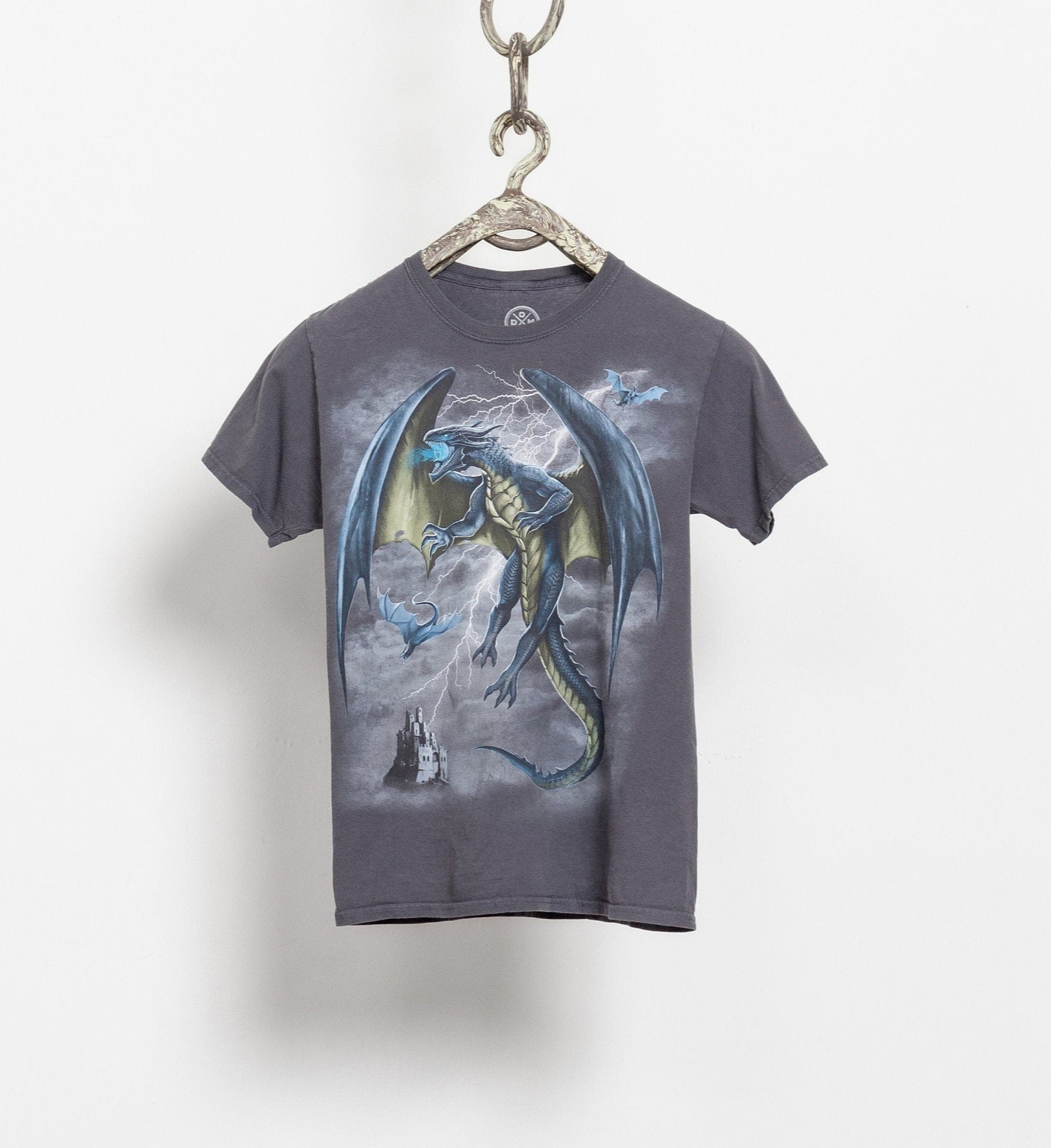 Gray t-shirt with dragon graphic on a hanger against a white background