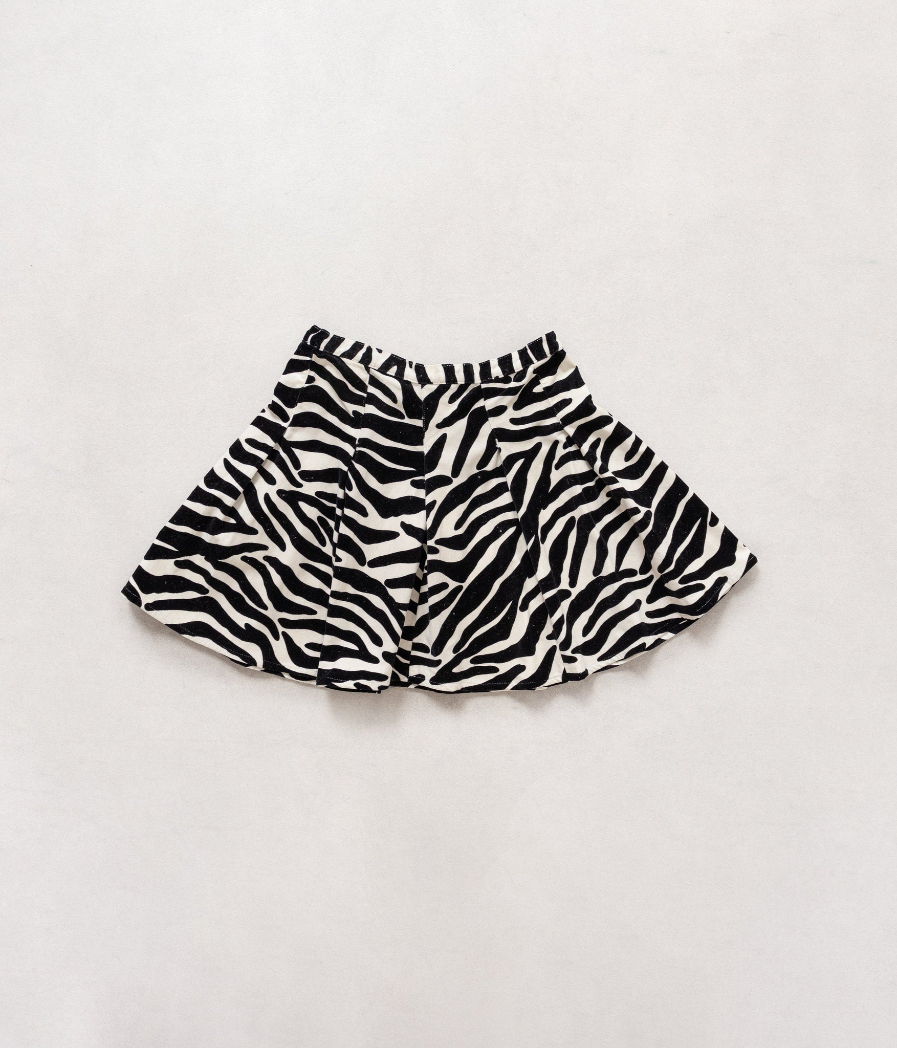Zebra print shorts on a light gray background