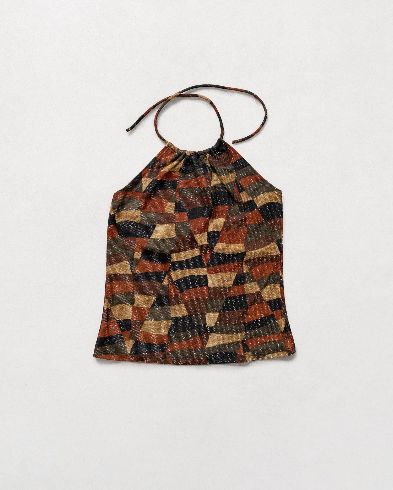 Multicolored geometric patterned bag on a white background