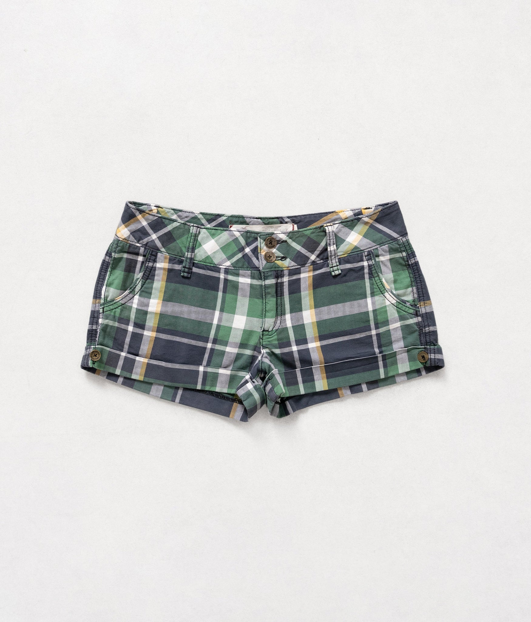 Plaid shorts on a white background