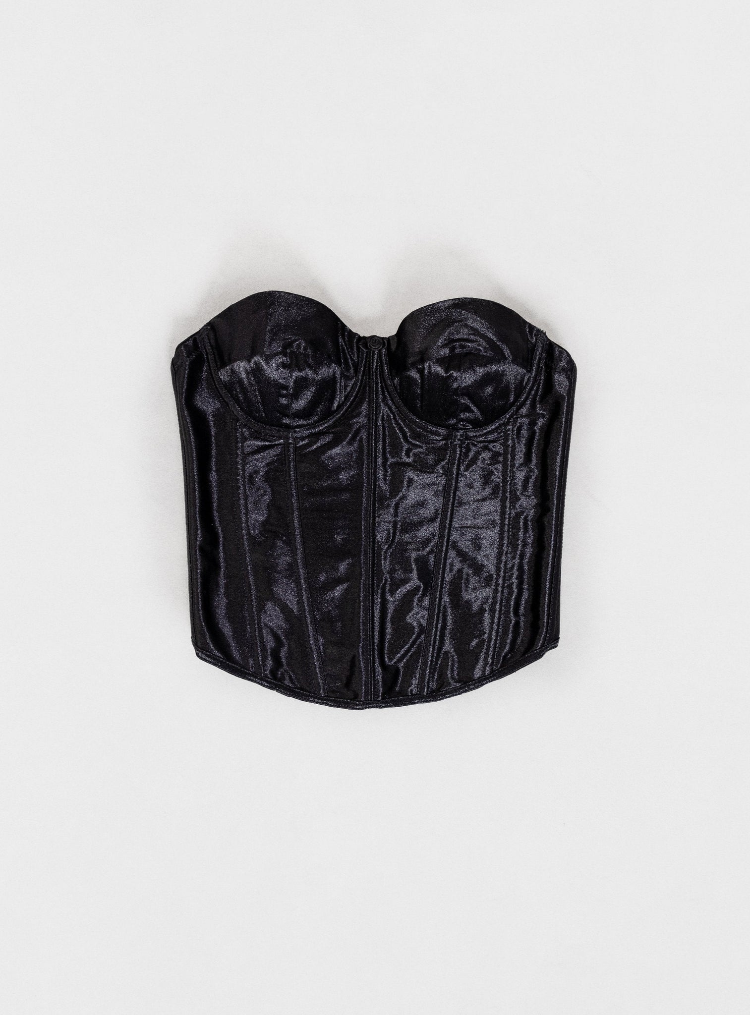 Black corset on a white background