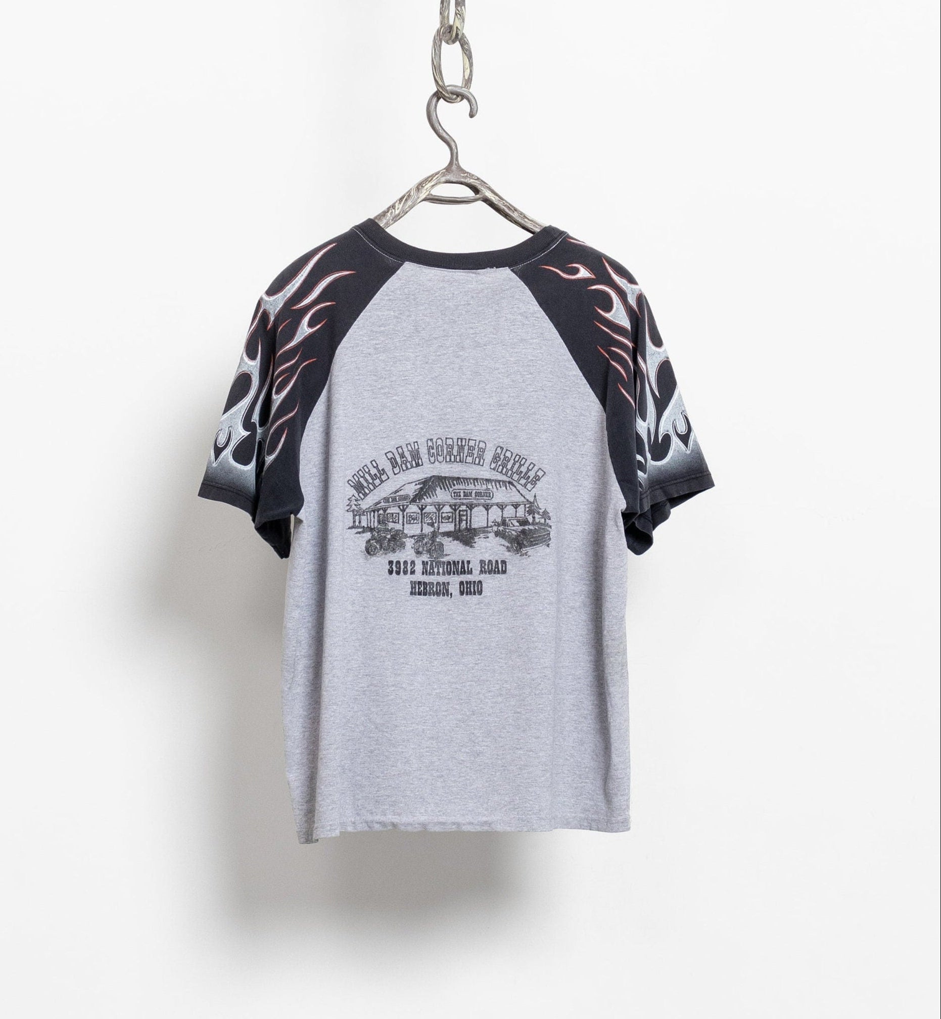 Gray and black baseball shirt with graphic design on a white background