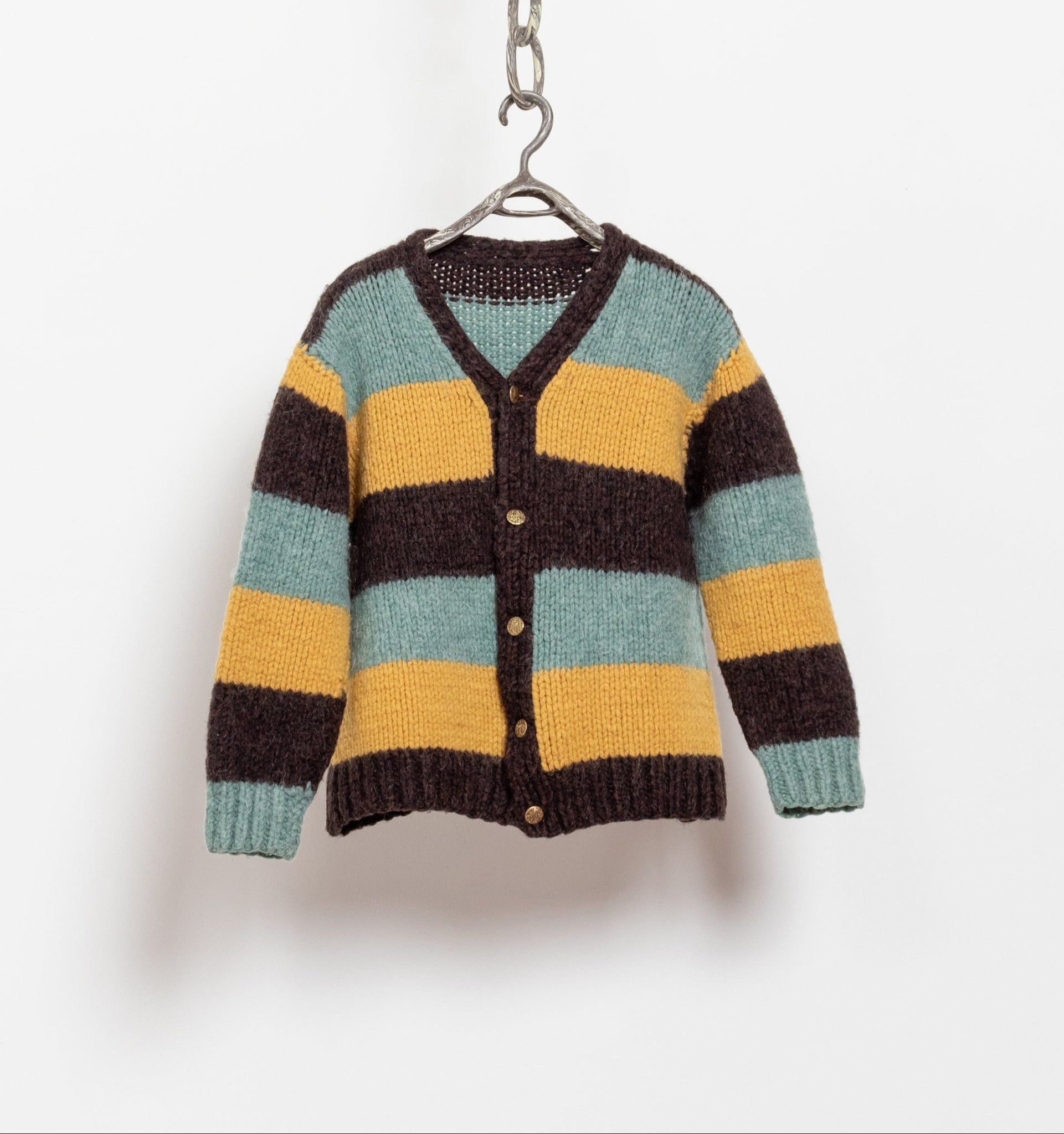 A vintage 90's knit button up cardigan in chunky stripes pattern, with a V-neck and front-buttoning closure, displayed on a hanger against a white background.