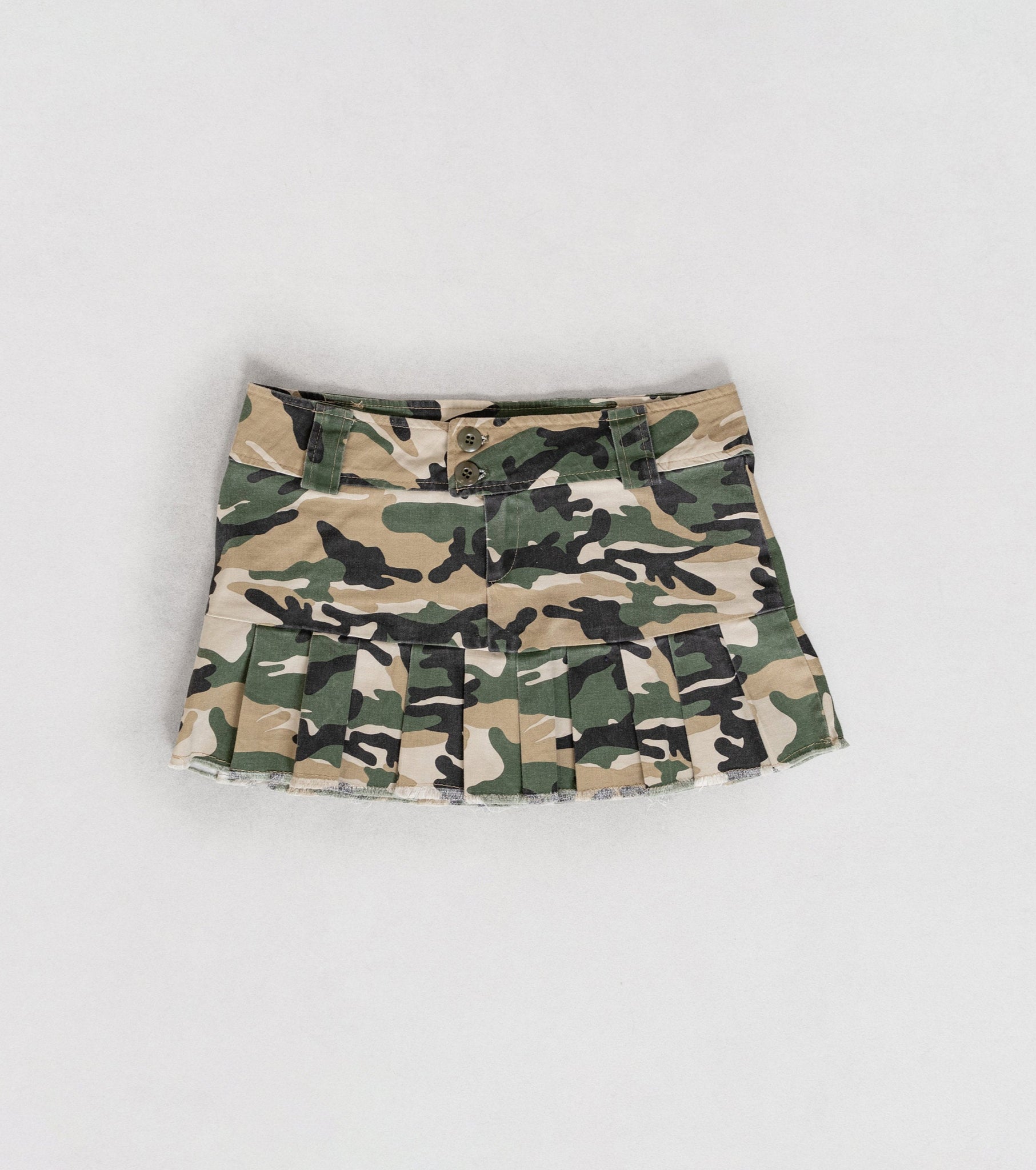 Camouflage patterned skirt on a light gray background